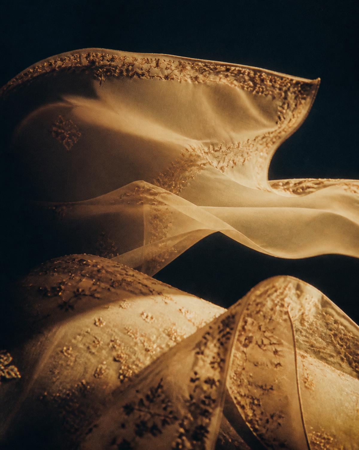 Embroidered fabric lifting in the light